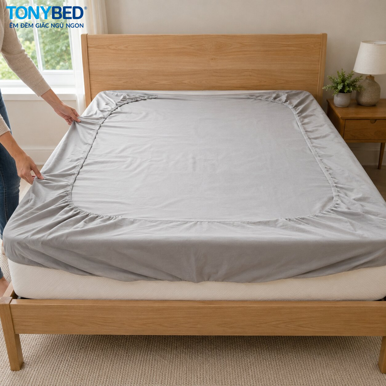 Đặt ga chun đúng chiều trên nệm trước khi trải